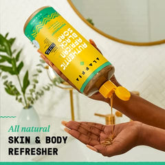 Alaffia Black Soap Liquid for face, hands, and body with soothing lather.