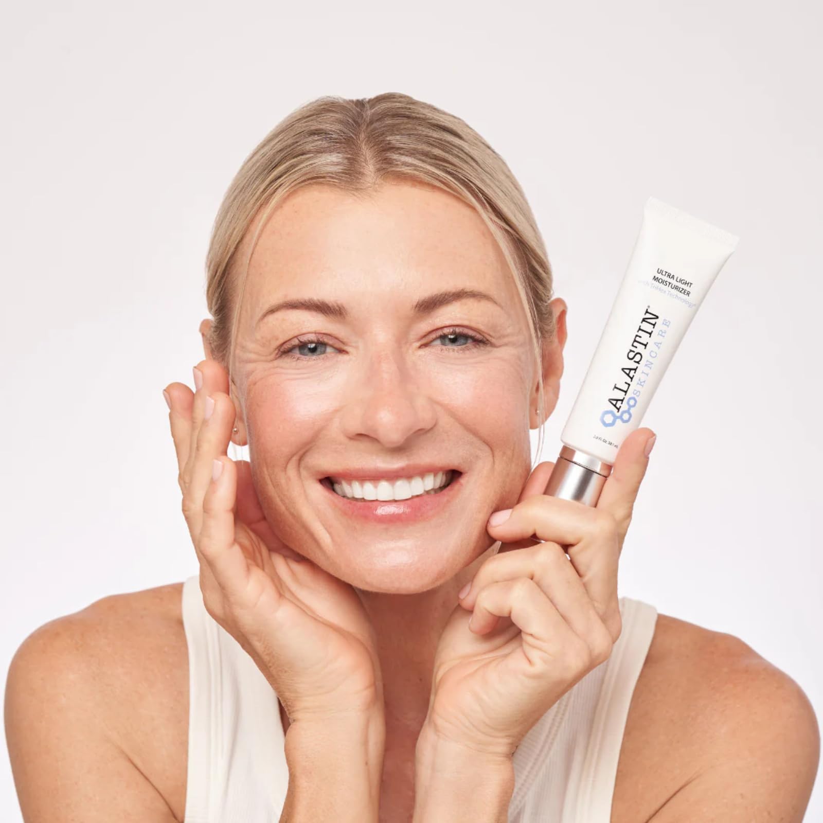 ALASTIN Skincare Ultra Light Daily Face Moisturizer in use with breathable, non-greasy feel