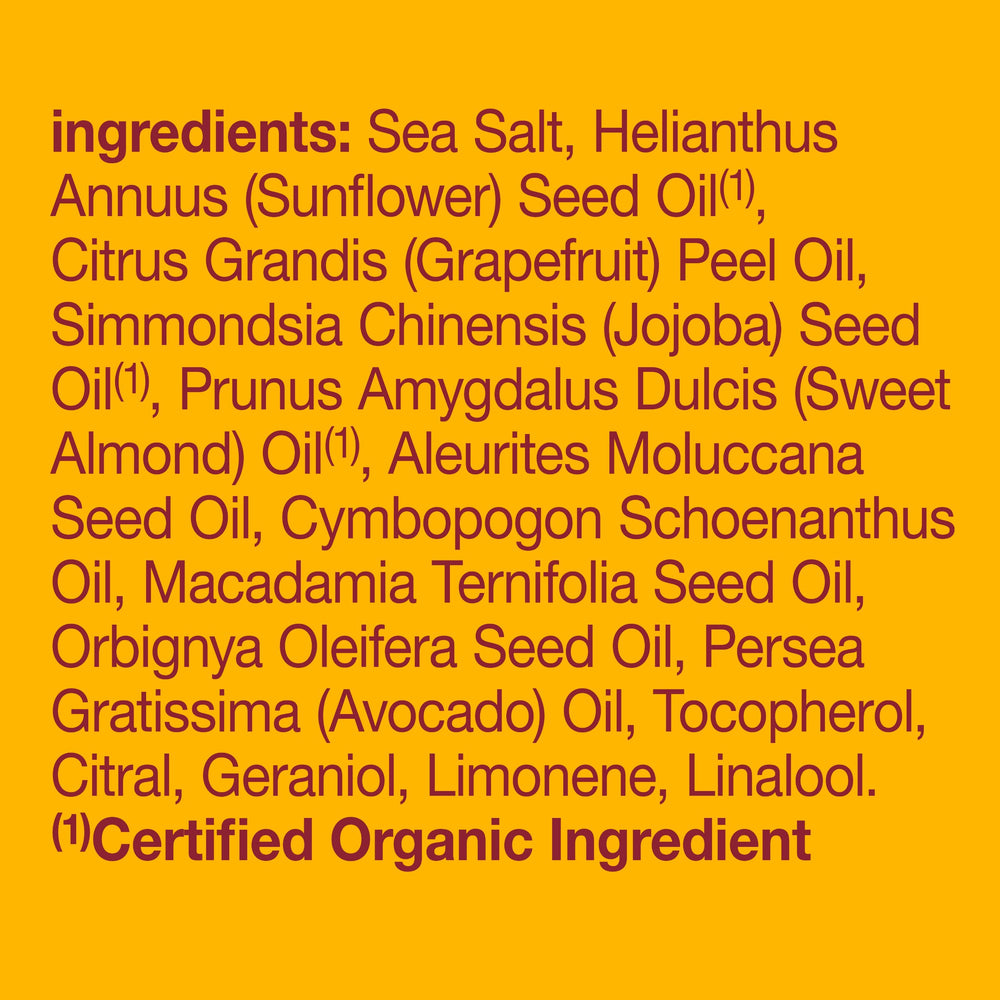 Pacific sea salts exfoliating dry skin on arms and legs.