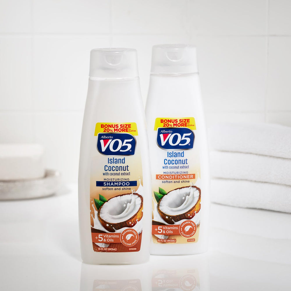 Shimmering lather of Alberto VO5 Island Coconut Shampoo enriching hair texture