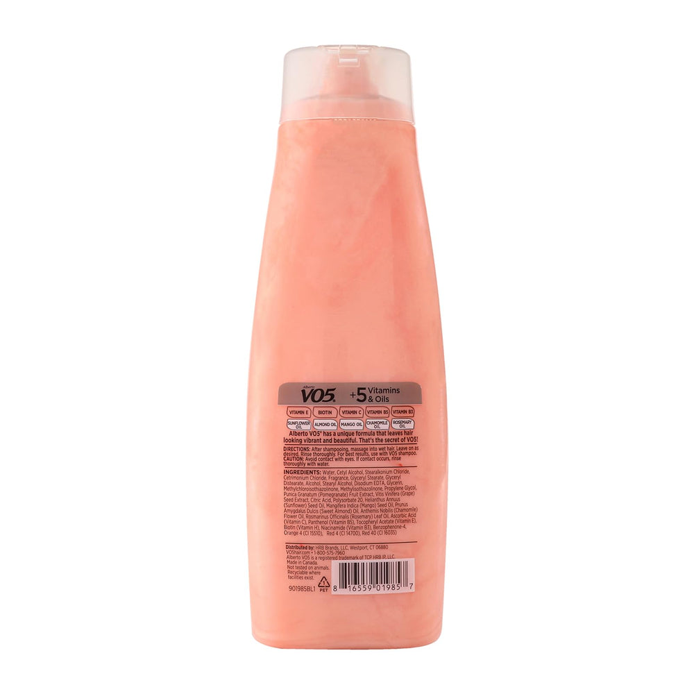 Alberto VO5 Pomegranate Bliss conditioner close-up showing creamy texture for moisture.