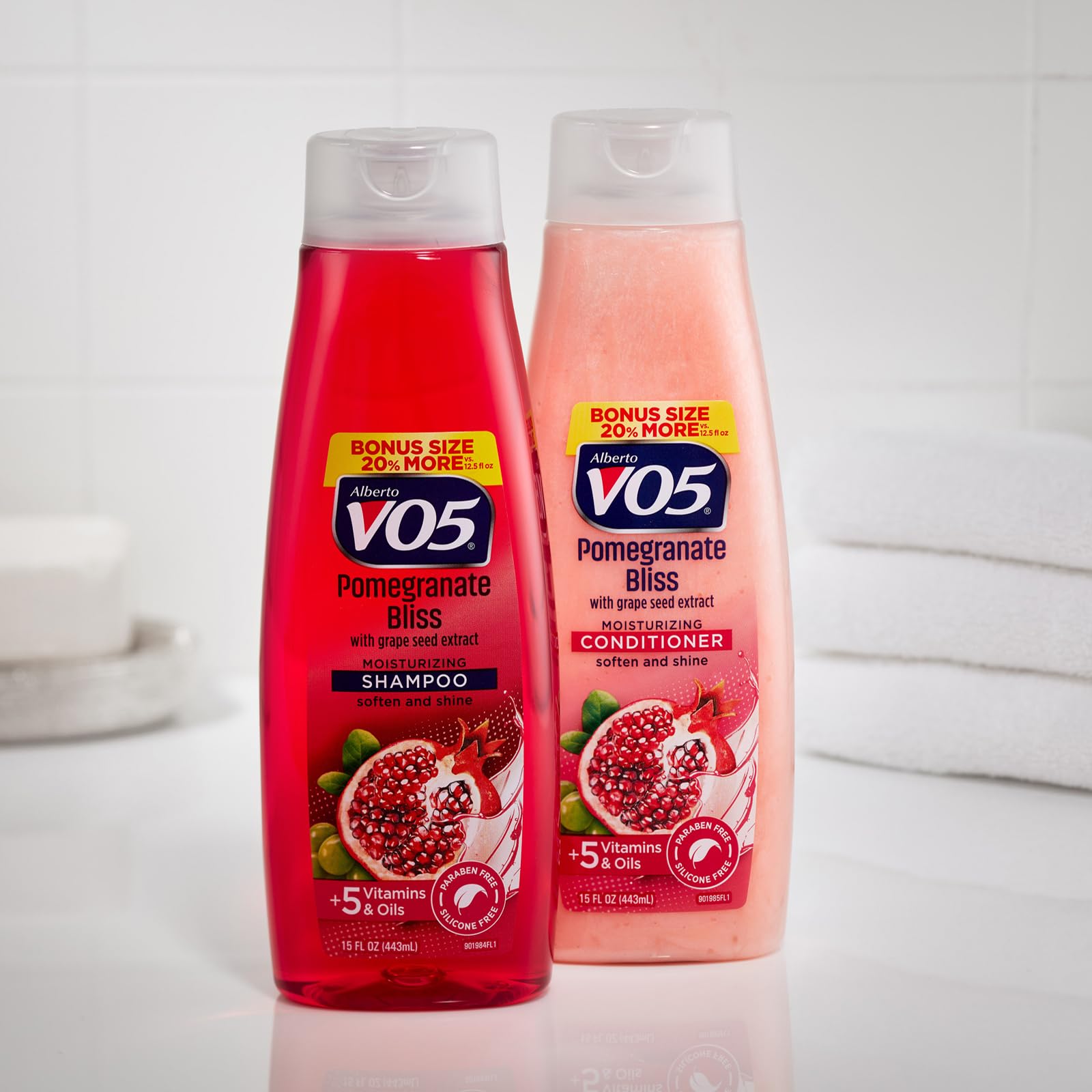 Alberto VO5 Pomegranate Bliss conditioner bottle in shower scene for clean formula and hydration.