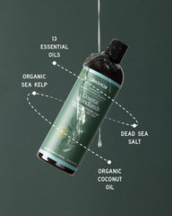 Aleavia Coastal Woodlands bottle on wood conveys natural, fragrance-conscious care.
