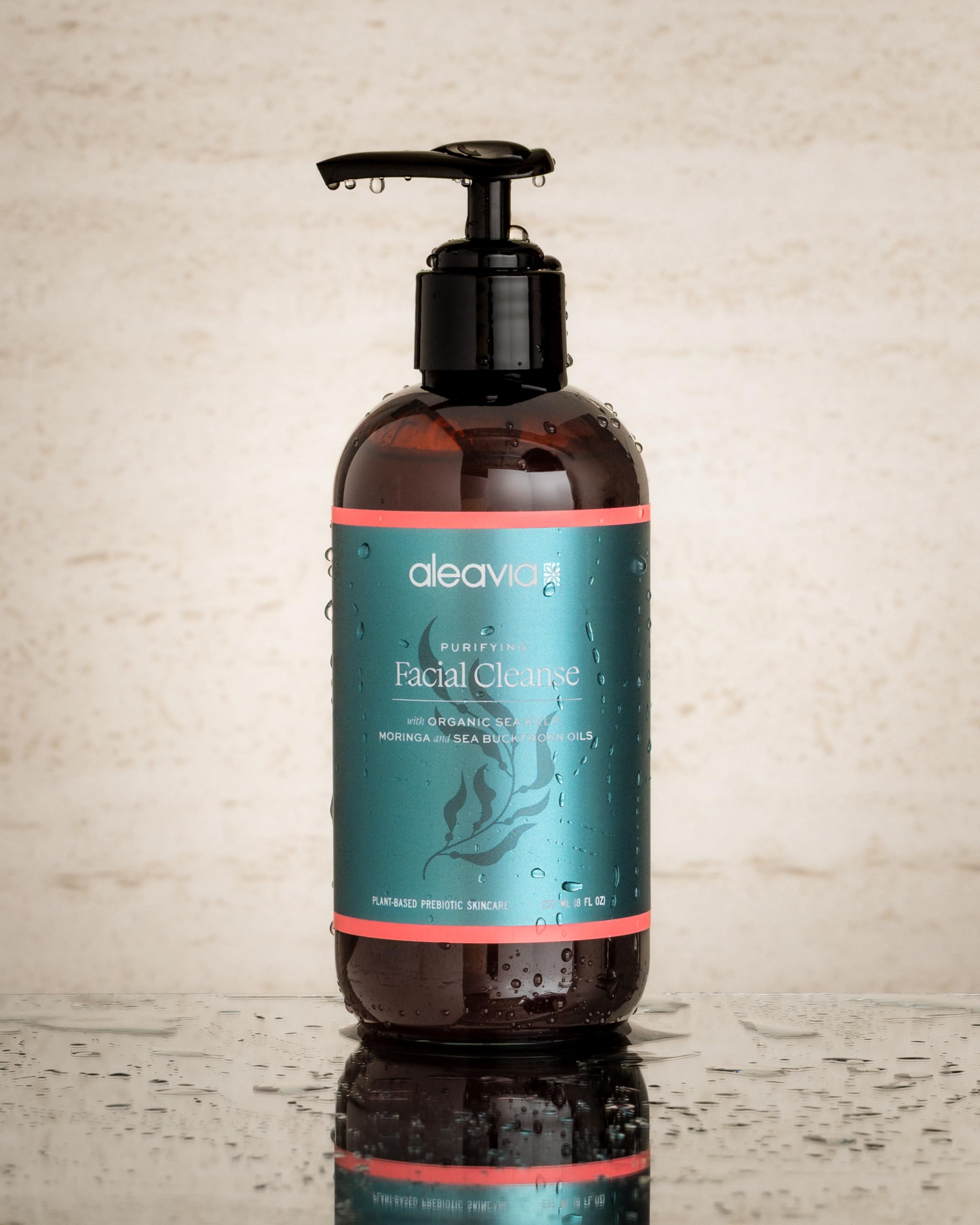 Aleavia Purifying Facial Cleanse natural ingredients montage emphasizes vegan, prebiotic care.