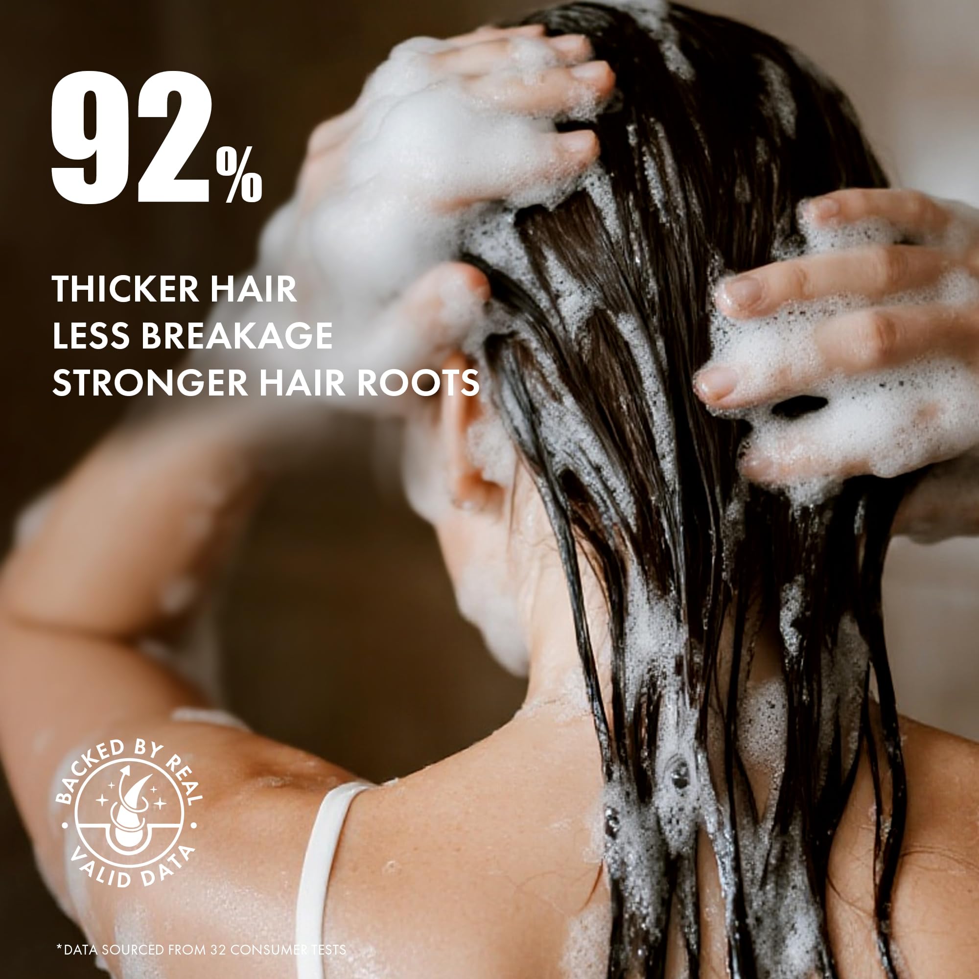 ALFHEIM Conditioner smoothing application on strands for manageability.