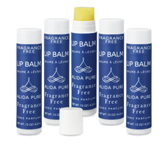 ALIDA PURE fragrance-free lip balm tube packaging shows vegan, beeswax-free design.