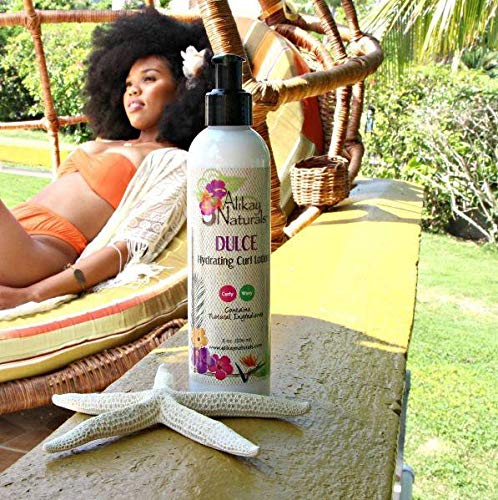 Dulce Hydrating Curl Lotion application shows creamy texture and even distribution
