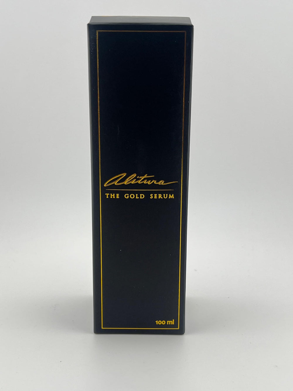 Close-up of Alitura Gold Serum jar showing luxurious texture