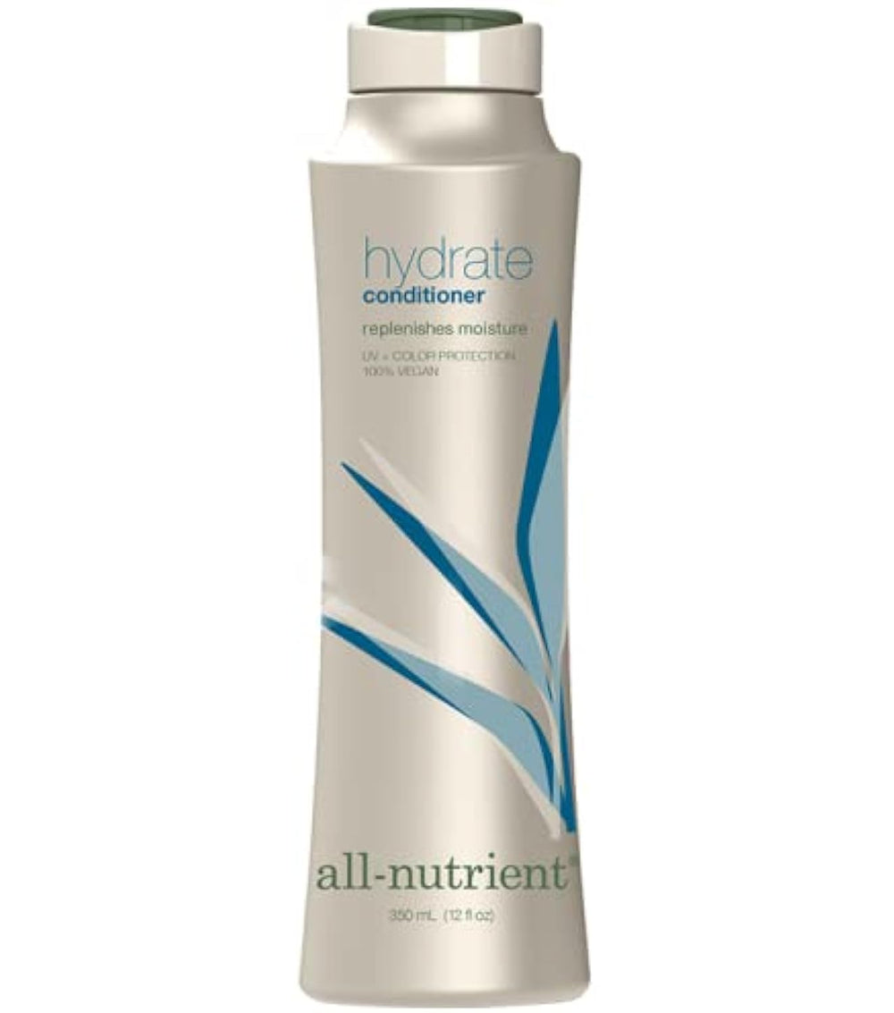 All Nutrient Hydrate Conditioner bottle pour showcases plant-infused hydration for smooth, shiny hair.