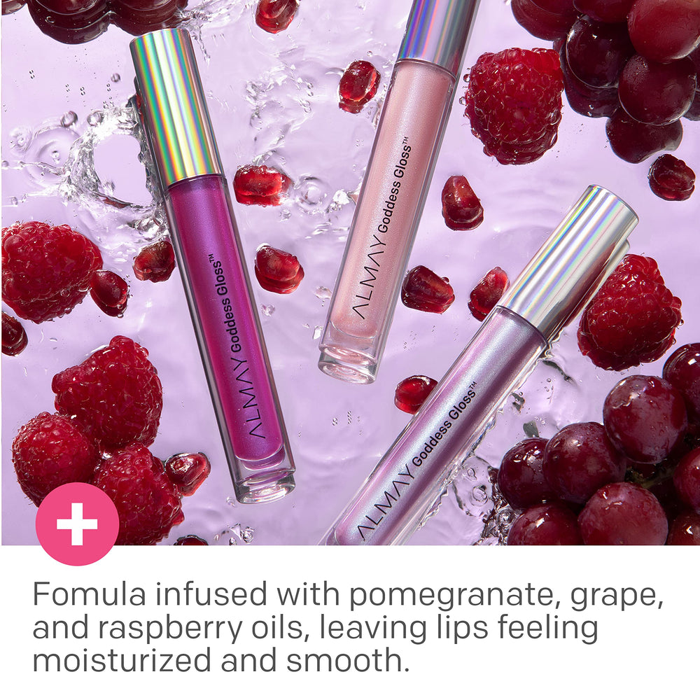 Almay Goddess Gloss Cosmic lip swatch shows sheer glow.