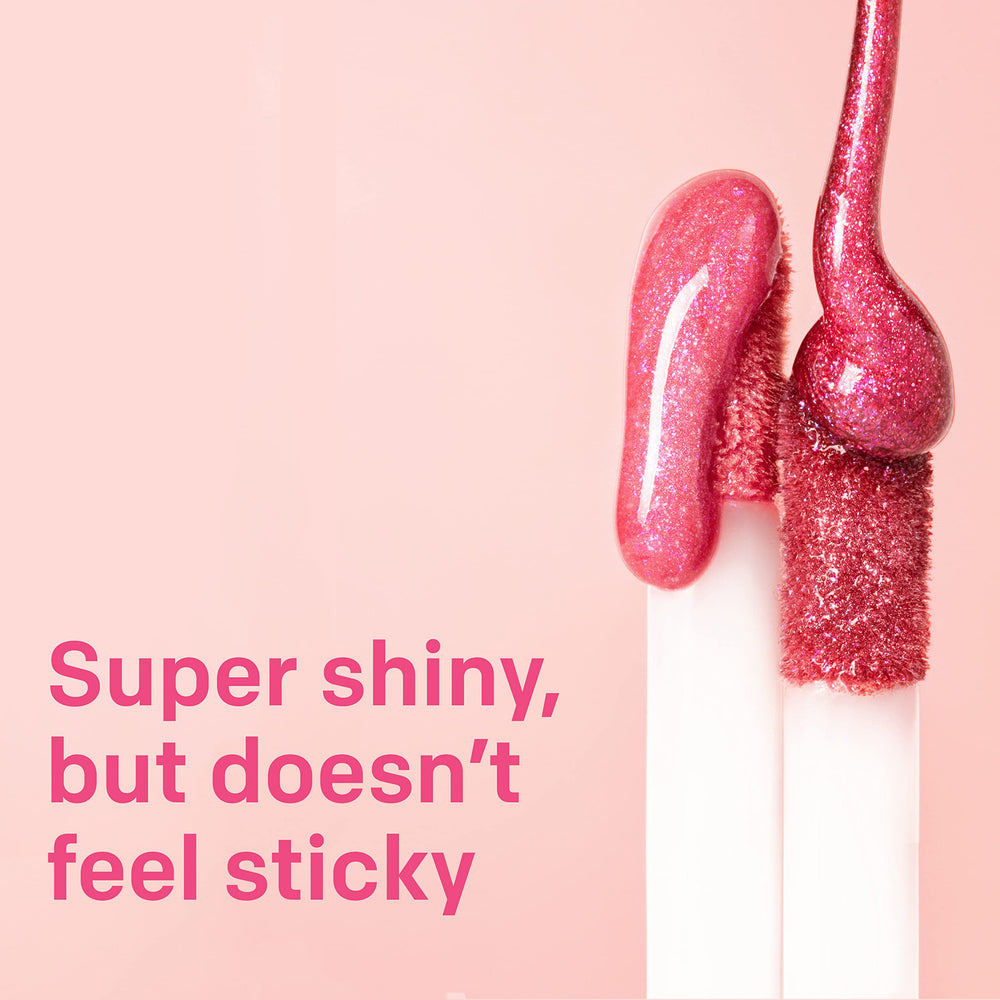 Close-up of Almay Lip Gloss 700 Flame packaging