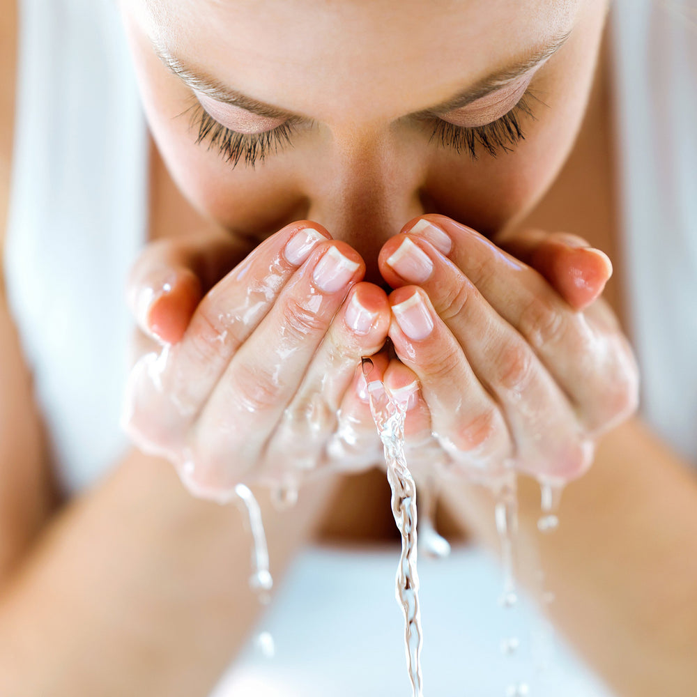 ALOA detoxifying charcoal close-up reveals visible charcoal particles for deep cleansing