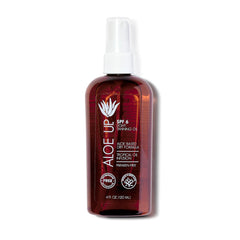 Aloe Up light tanning oil bottle with pump absorbs quickly and leaves a light, non-greasy finish.