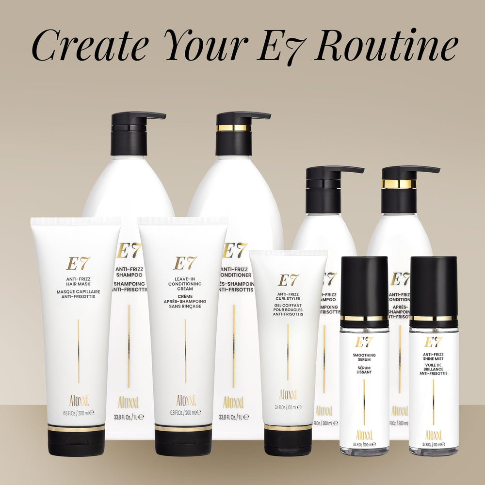 Hands applying ALOXXI conditioner to damp hair for detangling