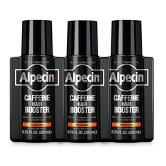 Alpecin caffeine hair booster bottle pour demonstrates energizing scalp care.