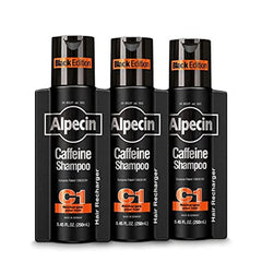 Alpecin Caffeine Shampoo C1 Black Edition 3-pack bottle on shelf, energizing scalp