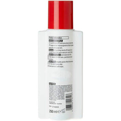 Alpecin Powerful Dandruff Killer Shampoo being poured into the hand for gentle cleansing.