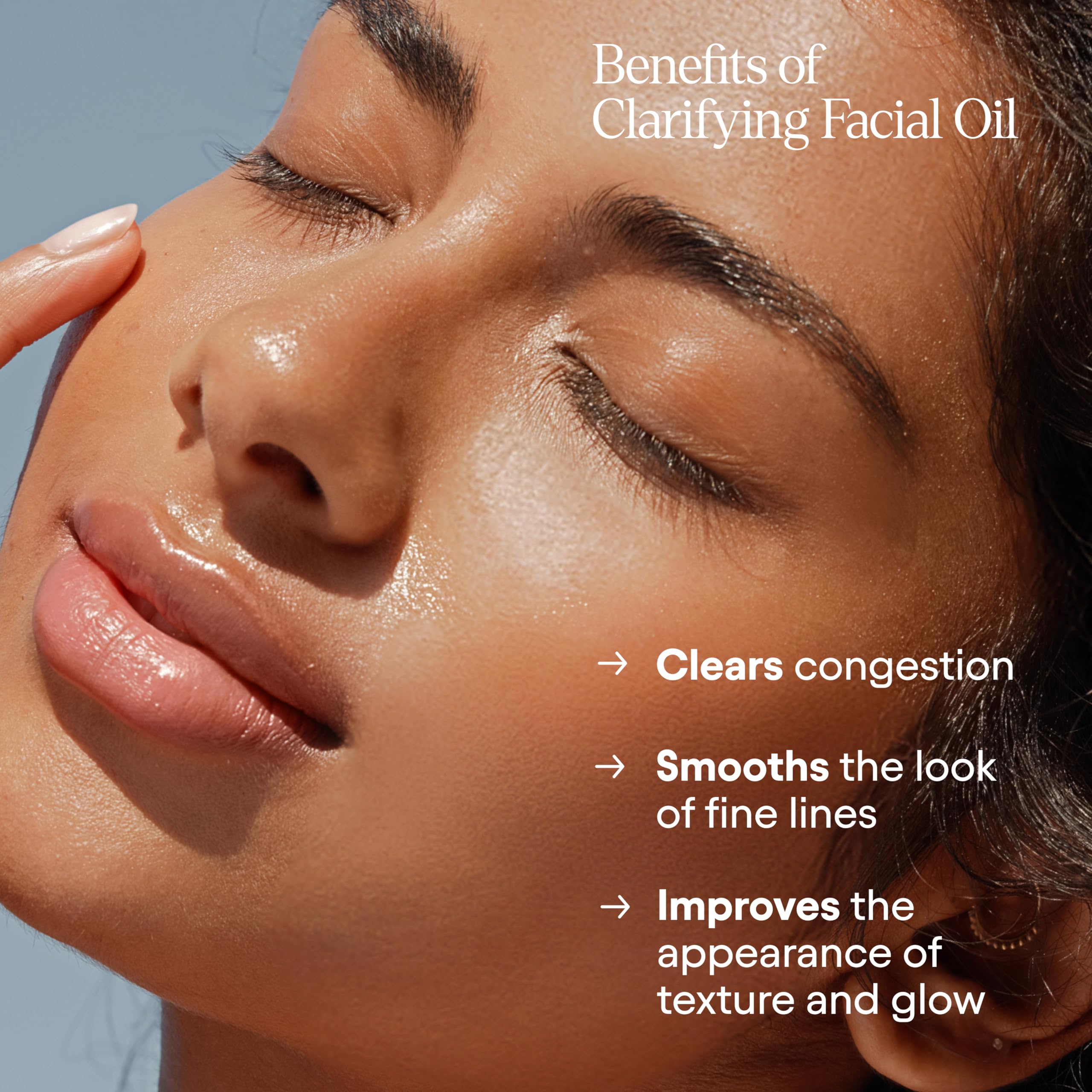 Red raspberry ingredient close-up in Alpyn Clarifying Oil highlights soothing protective benefits.