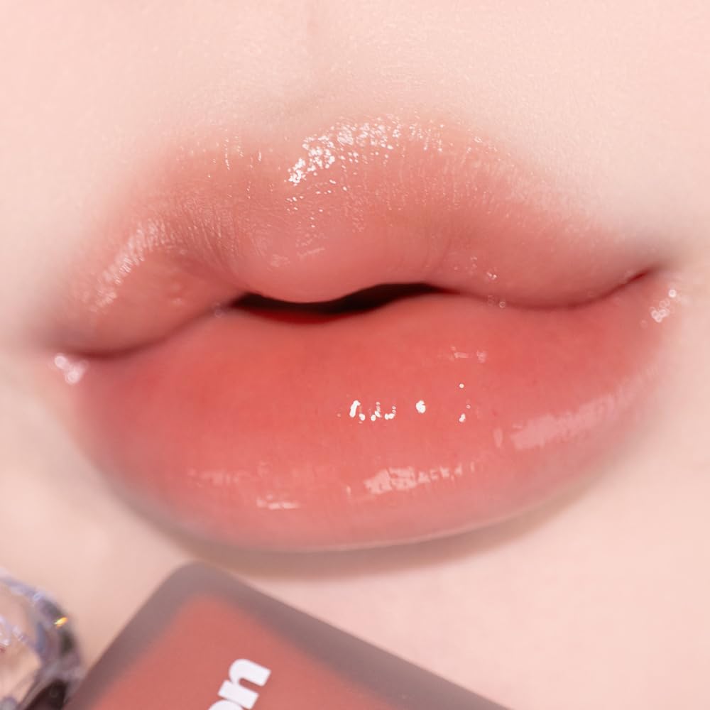 Alternativestereo Lip Potion Fig Candy on lips, warm playful tint with non sticky shine.