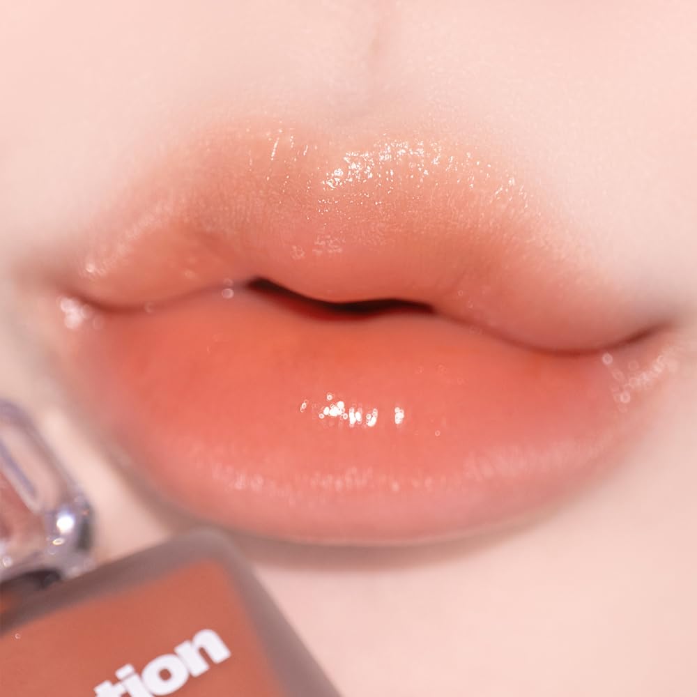 alternativestereo Lip Potion Aqua Glow No.2 Fig Candy swatch reveals warm, wearable tint and non-sticky shine.