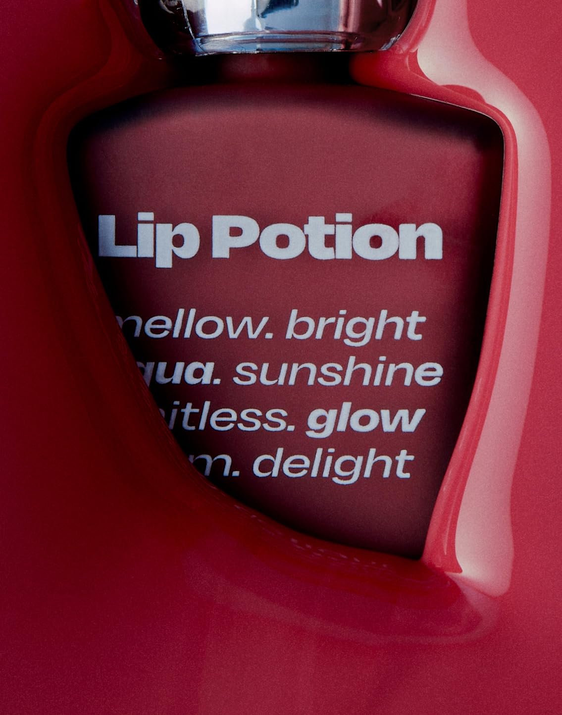 Alternativestereo Lip Potion Aqua Glow No.7 Pink Soda swatch with bubbly pink shine.