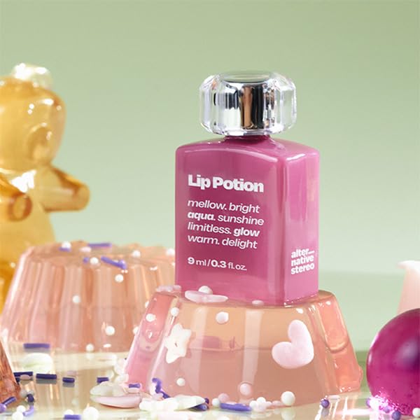 Alternativestereo Lip Potion Aqua Glow No.8 Sugar Purple lip swirls with soft lavender tint.
