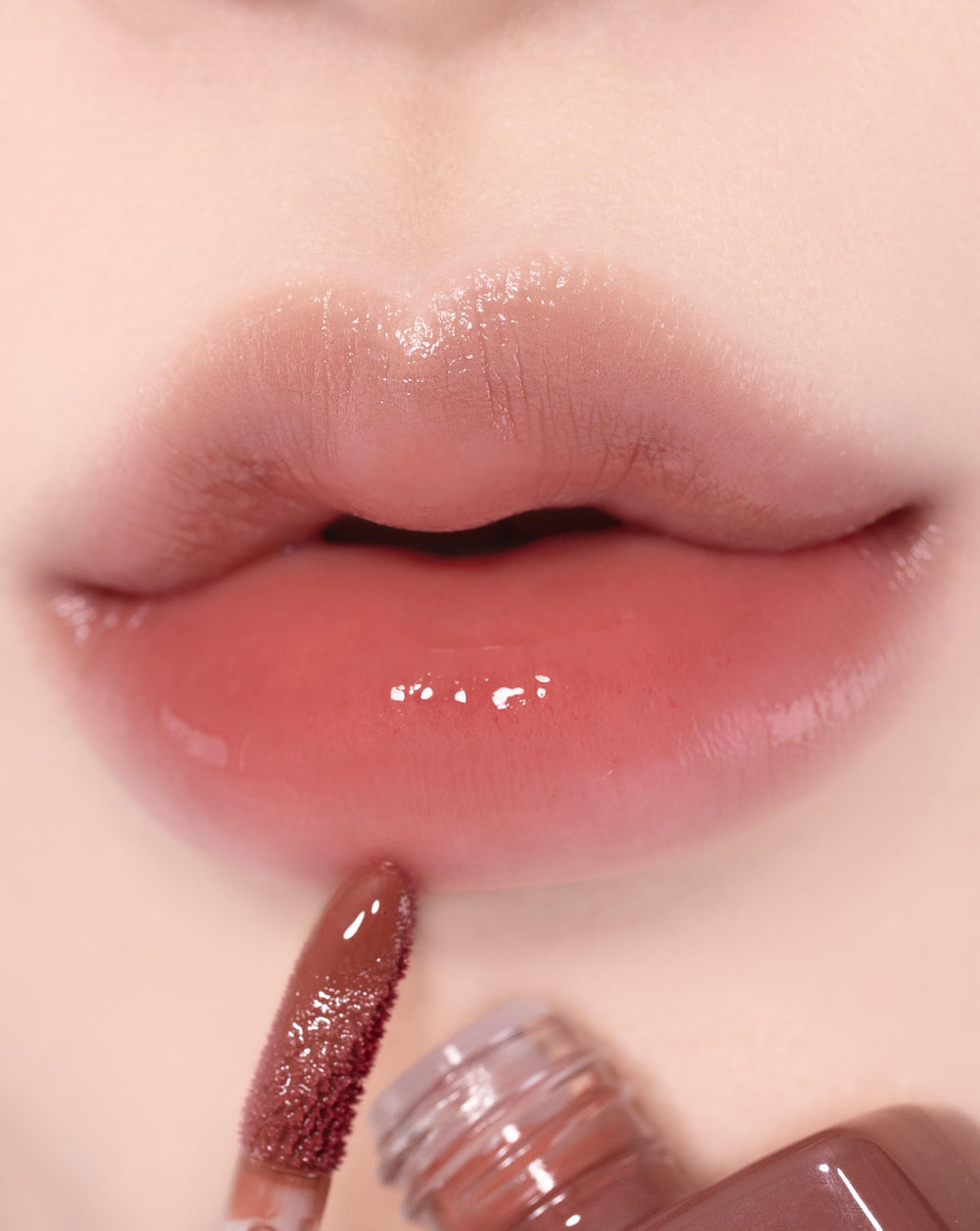 alternativestereo Lip Potion Aqua Glow No.9 Coco Milk sheer nude shade for subtle radiance and easy layering.