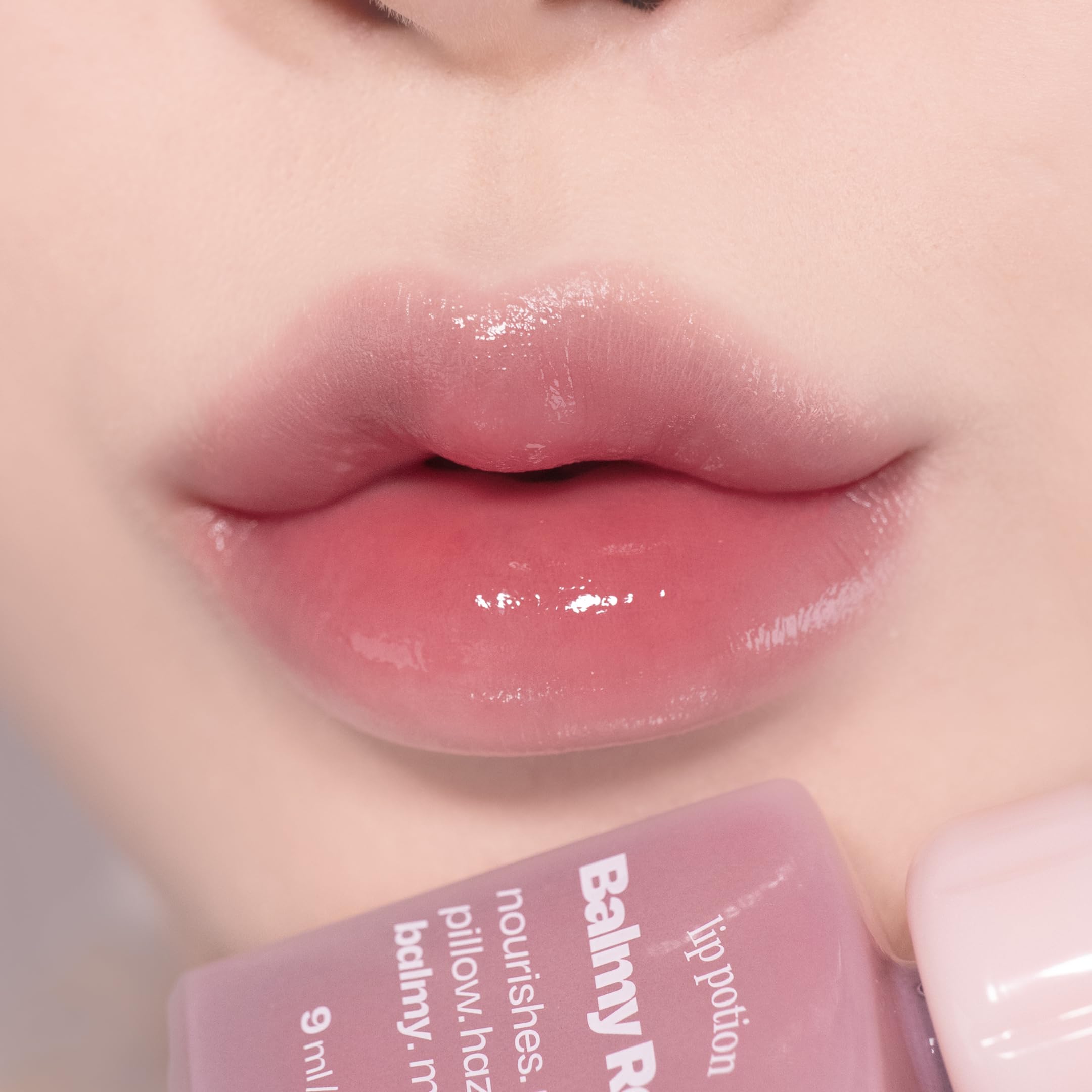alternativestereo Lip Potion Balmy Rose on cheeks provides natural, buildable flush.