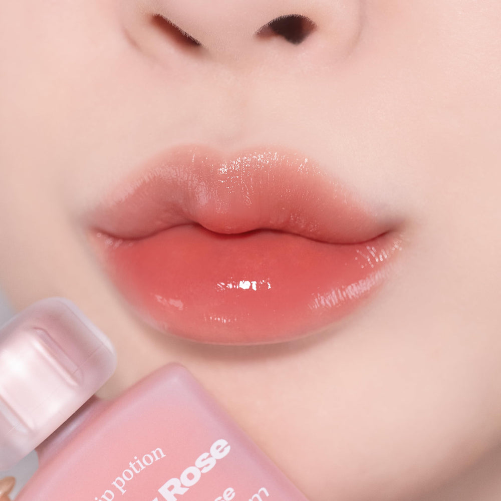 alternativestereo Lip Potion Balmy Rose swirl demonstrates buildable color and glow