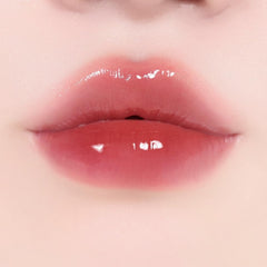 Alternativestereo Lip Potion Sugar Glaze Tint wine swatch showcases long-lasting color.