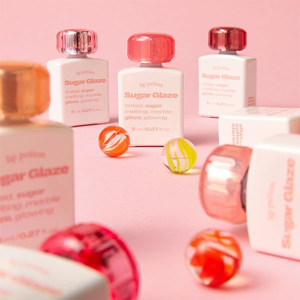 Alternativestereo Lip Potion Sugar Glaze Tint satin-finish on lips after application.