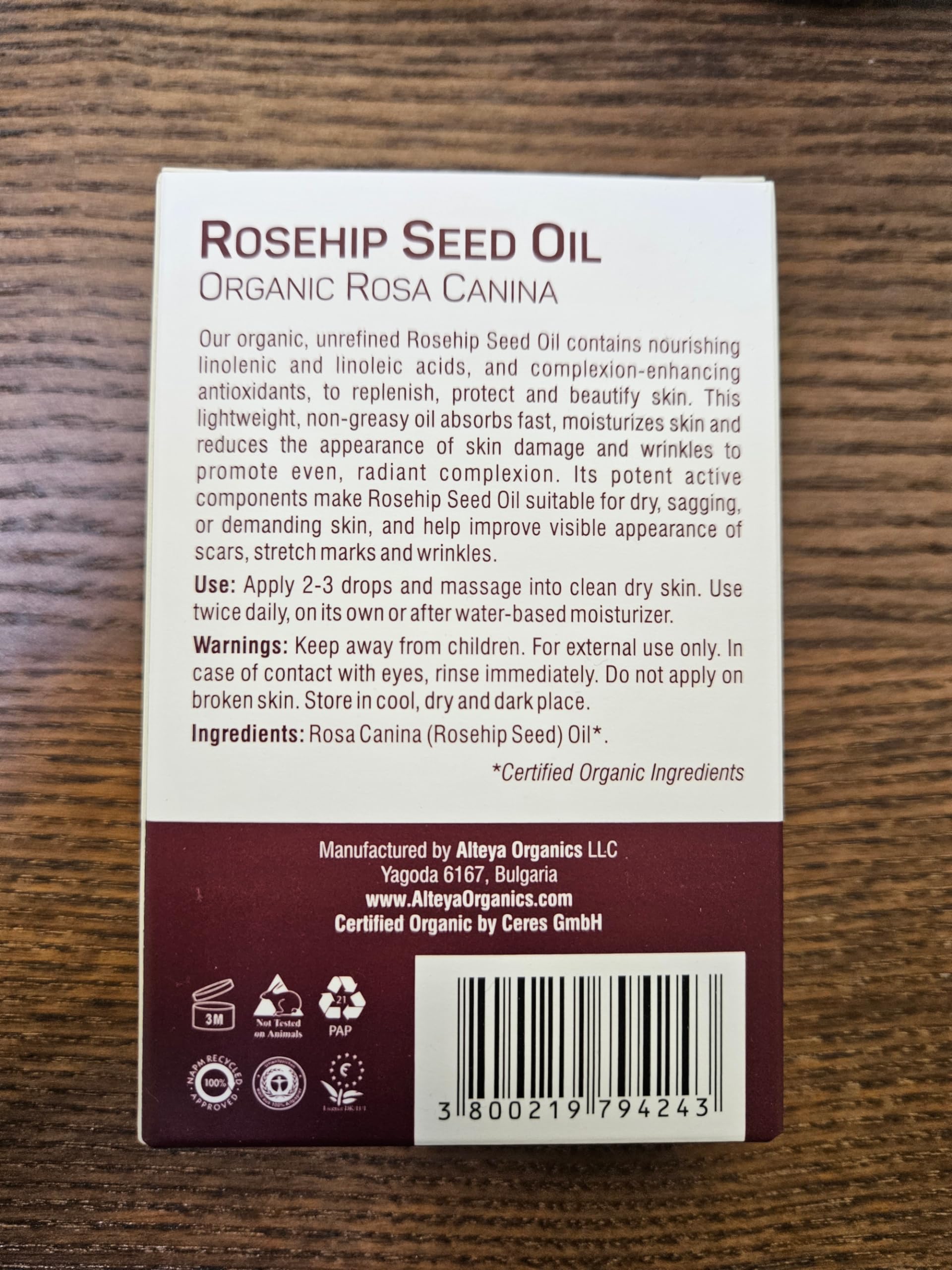 Close-up of Alteya Rosehip Seed Oil bottle showing potency