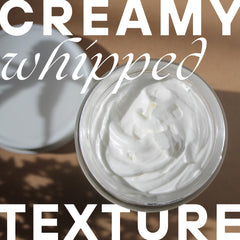Person applying Amallow moisturizer to skin during routine