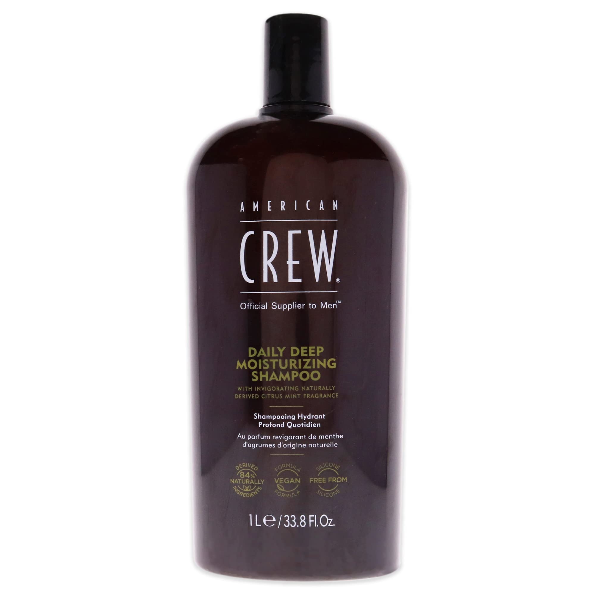 American Crew Daily Moisturizing Shampoo pump top illustrating convenient dispensing.