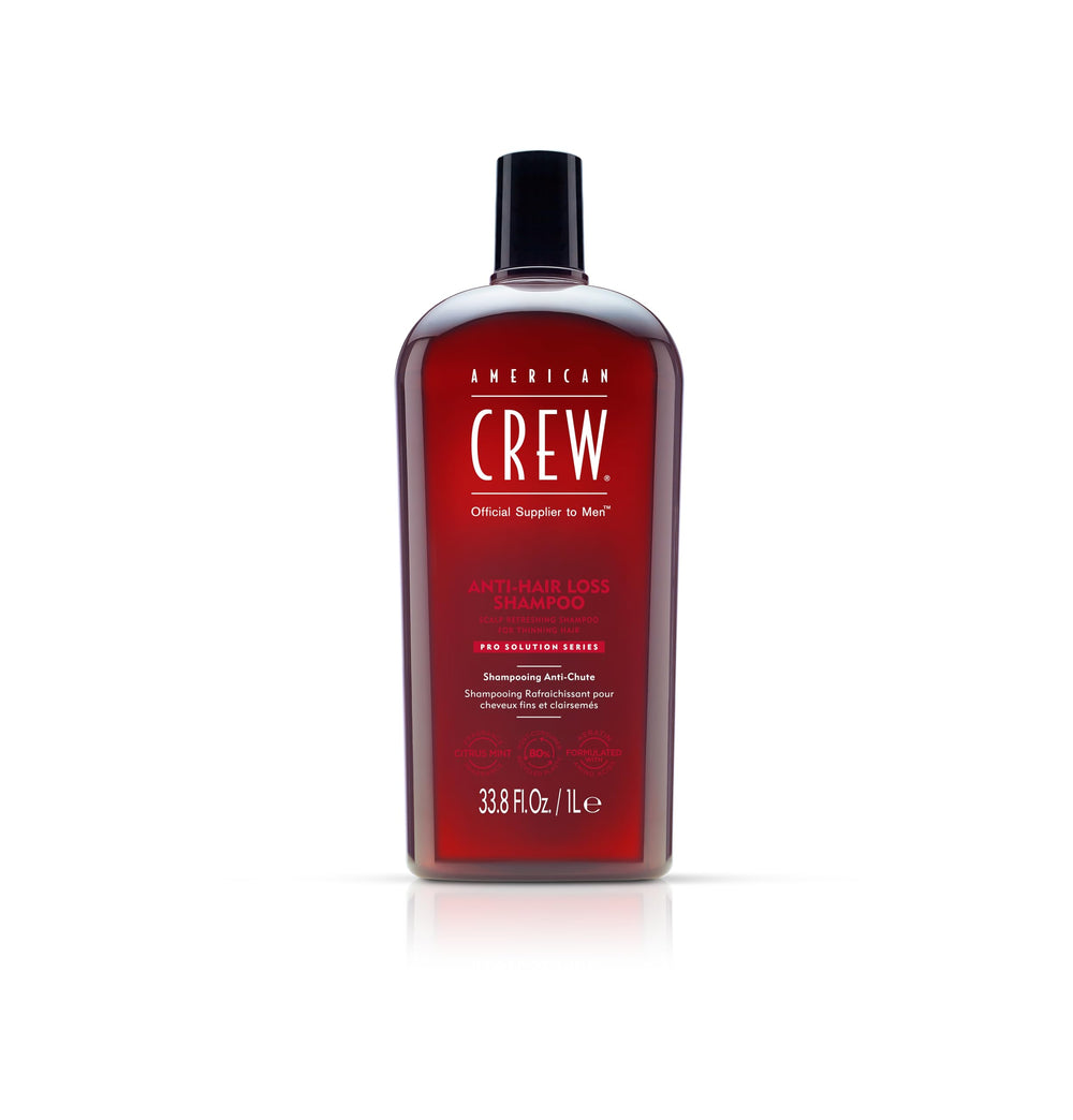 American Crew Fortifying Shampoo bottle refreshing scalp and cleansing thinning hair.