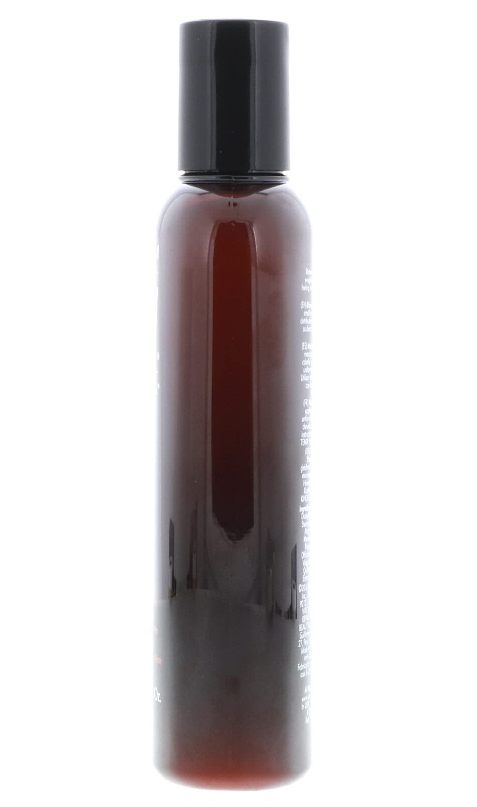Bottle of American Crew Stimulating Daily Conditioner on scalp showing refreshing sensation