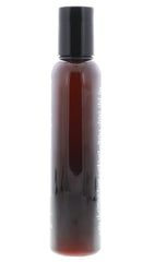 Bottle of American Crew Stimulating Daily Conditioner on scalp showing refreshing sensation