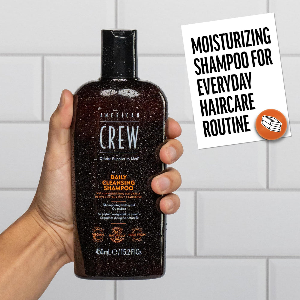 Label highlights vegan formula and naturally derived ingredients in American Crew shampoo.