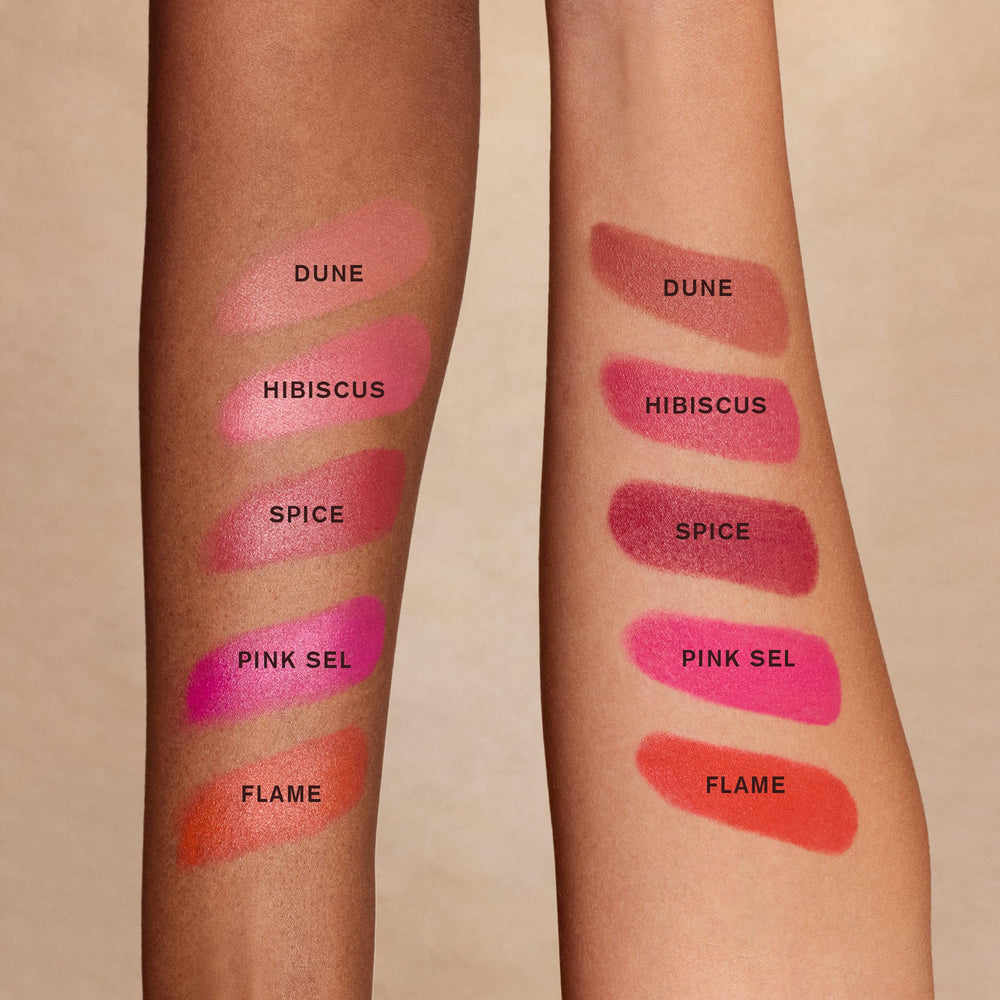 AMI COLÉ Desert Date Cream Multistick Pink Sel on cheeks for a soft glow
