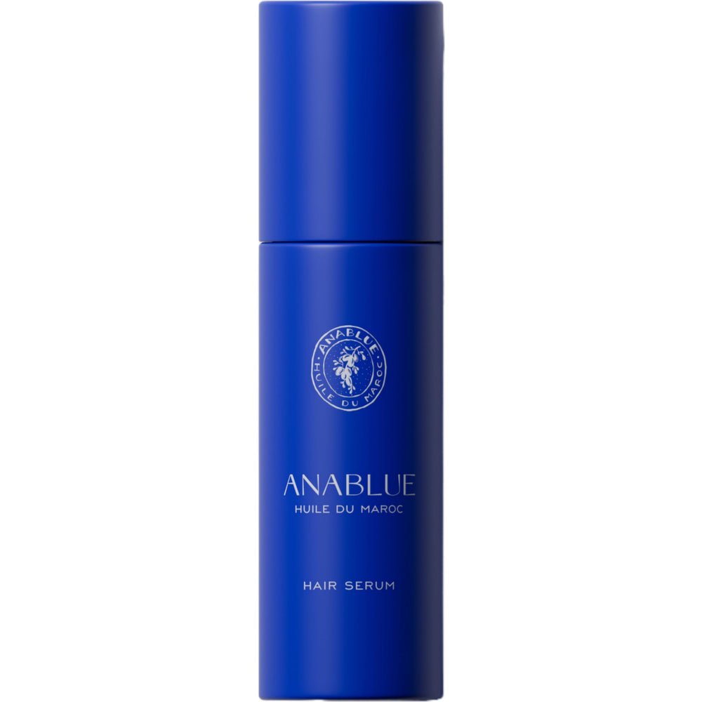 Anablue Hair Serum bottle pour demonstrates weightless shine in action.