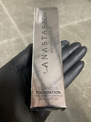 Anastasia Beverly Hills Luminous Foundation 200W swatches show warm undertones blending.