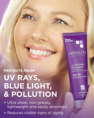 Andalou Naturals SPF 30 mineral sunscreen on face showing light texture.