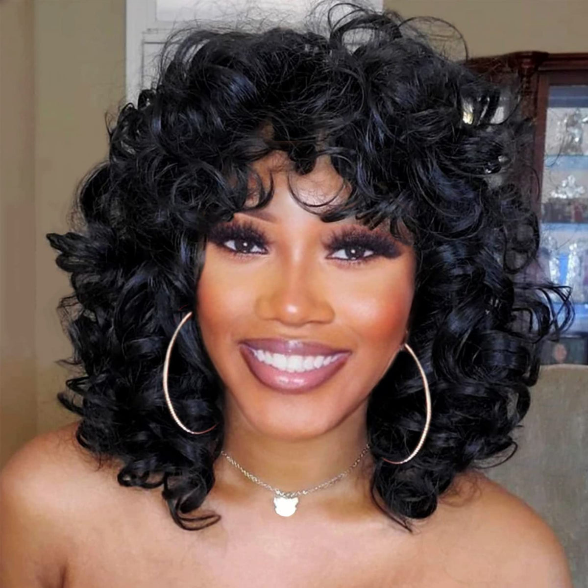 Andromeda Curly Wig with black bangs, 14in, for natural daily styling.