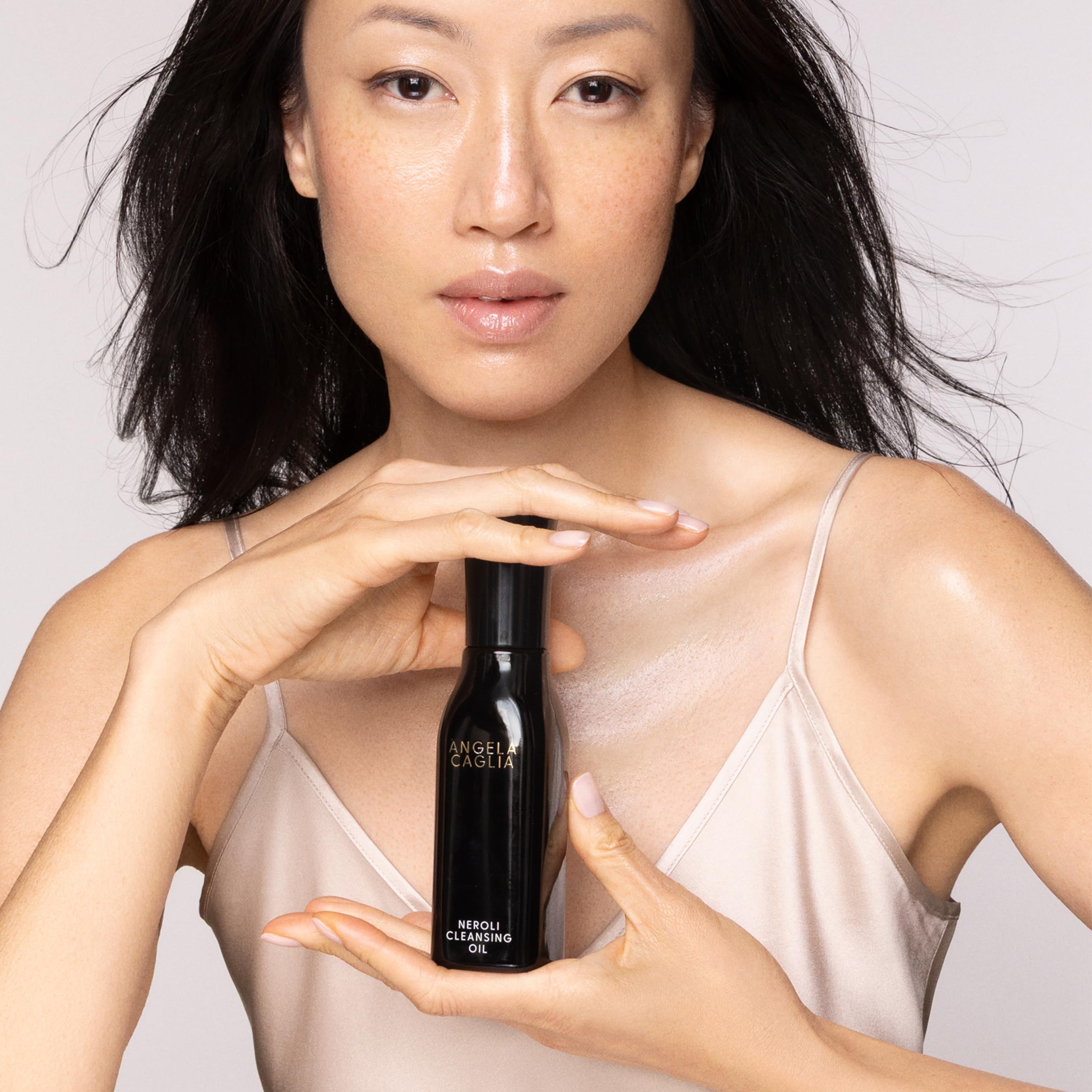 Angela Caglia Neroli Cleansing Oil emulsifies into a milky wash during application.
