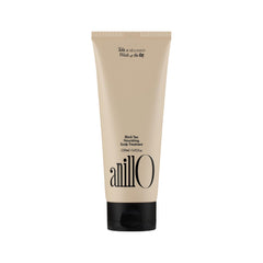 ANILLO Black Tea Vegan Hair Mask bottle highlighting deep conditioning for silkier hair.