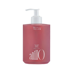 ANILLO Rosy Night Repair Shampoo bottle on sink for color-safe cleansing.