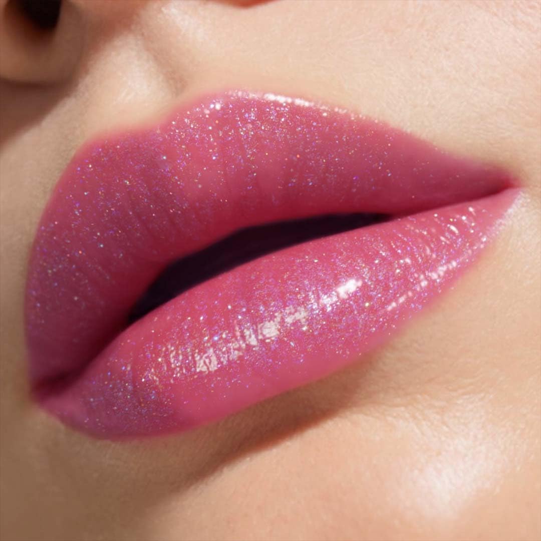 ANNA SUI Lipstick P application demonstrates smooth glide and even color.