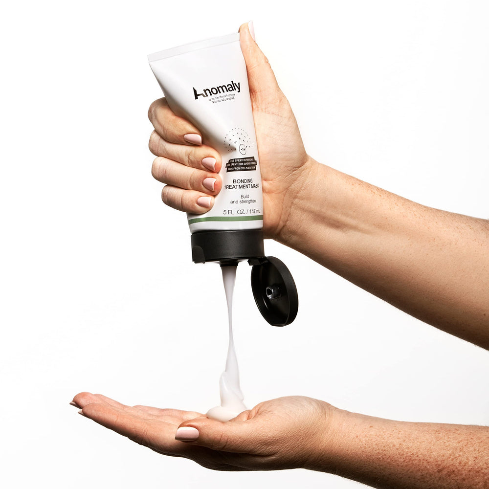 Application close-up of Anomaly mask demonstrating smooth, manageable strands