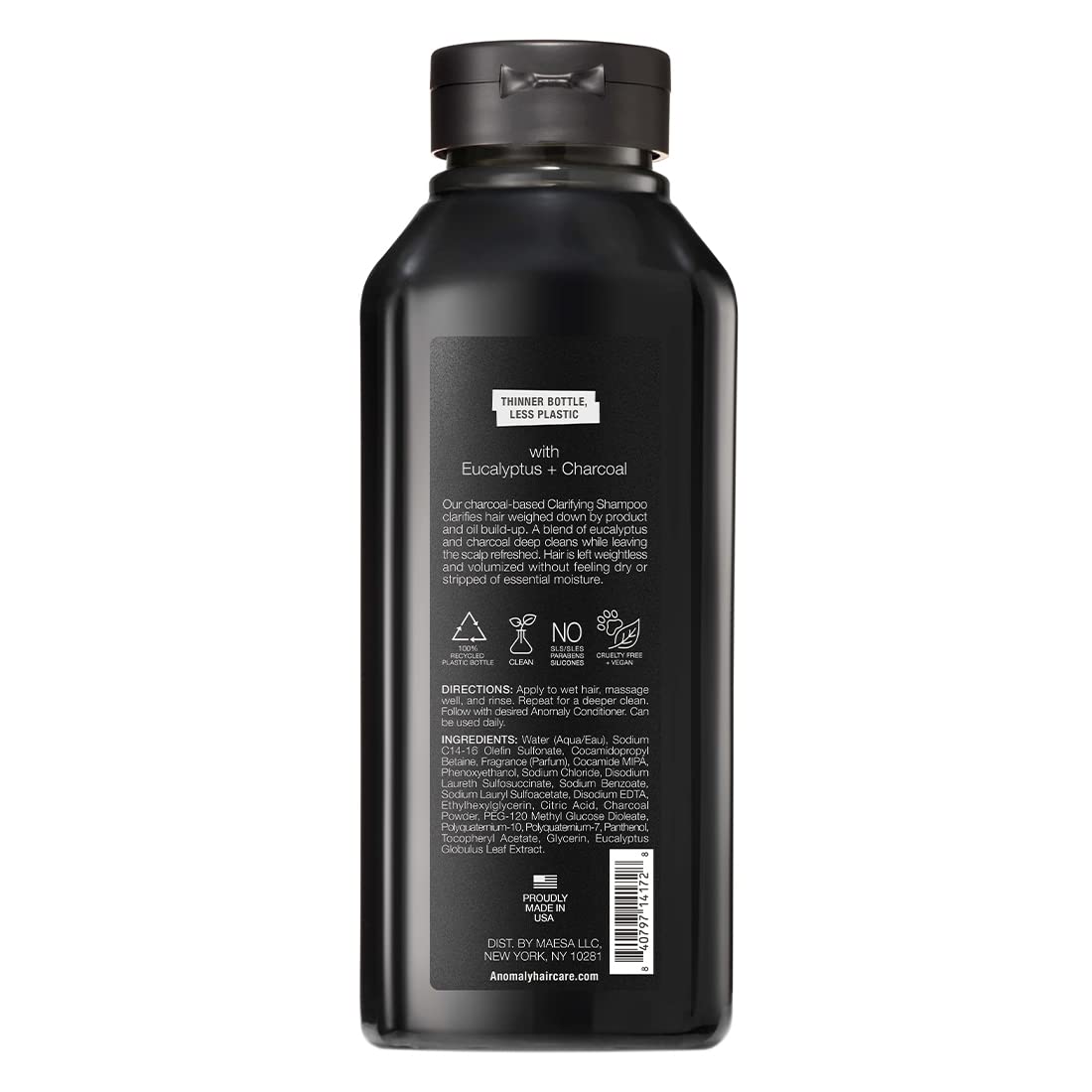 Anomaly Clarifying Shampoo charcoal close-up indicating oil and buildup removal action.