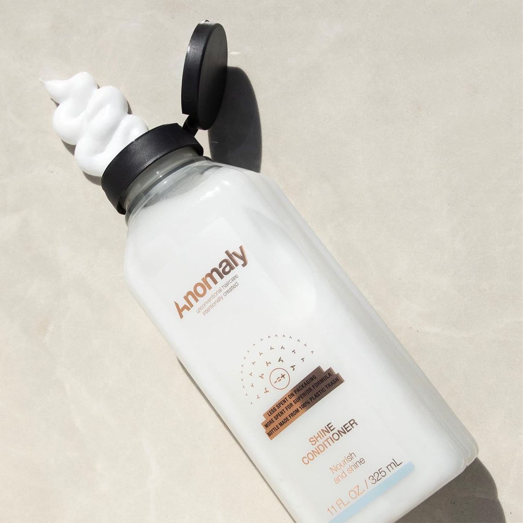 Anomaly Shine with murumuru butter for creamy detangling.